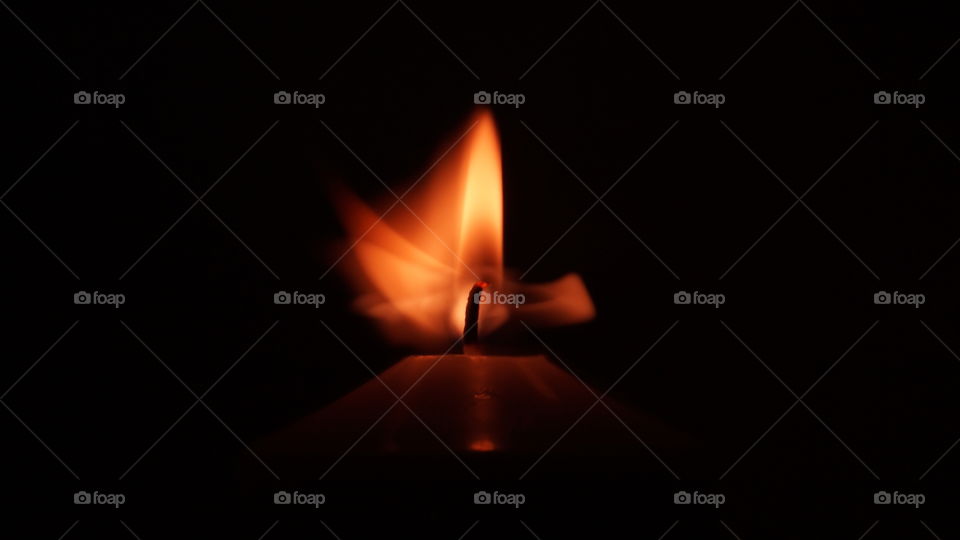 Candle fire moving during long exposure.