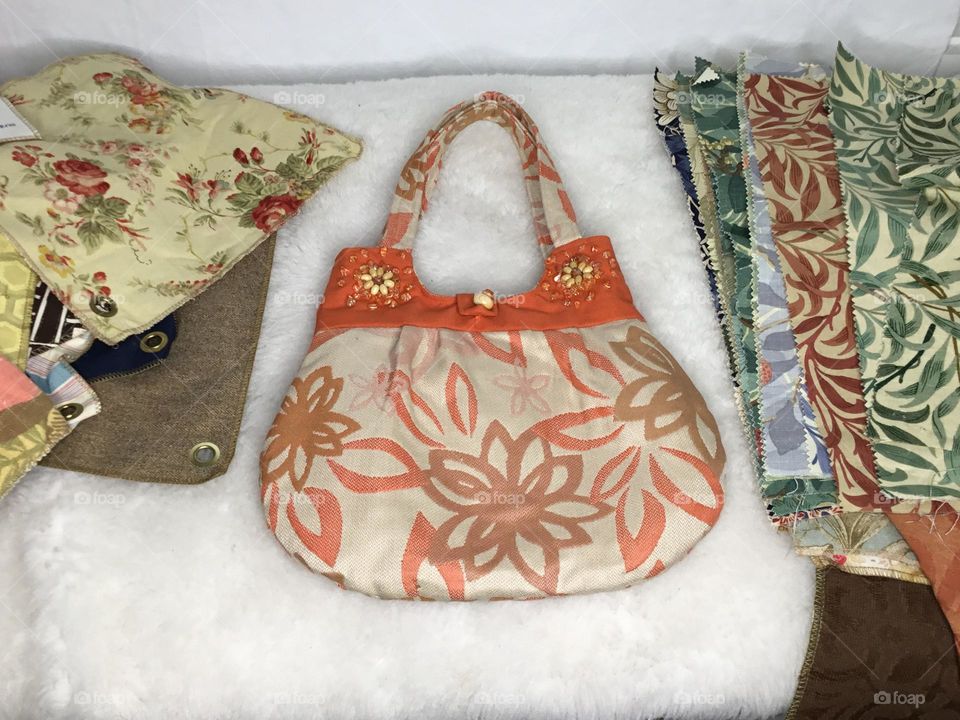Patchwork Purse is a unique, one of a kind bag, in a gorgeous assortment of prints and solid fabric samples and remnants that create a neutral yet versatile