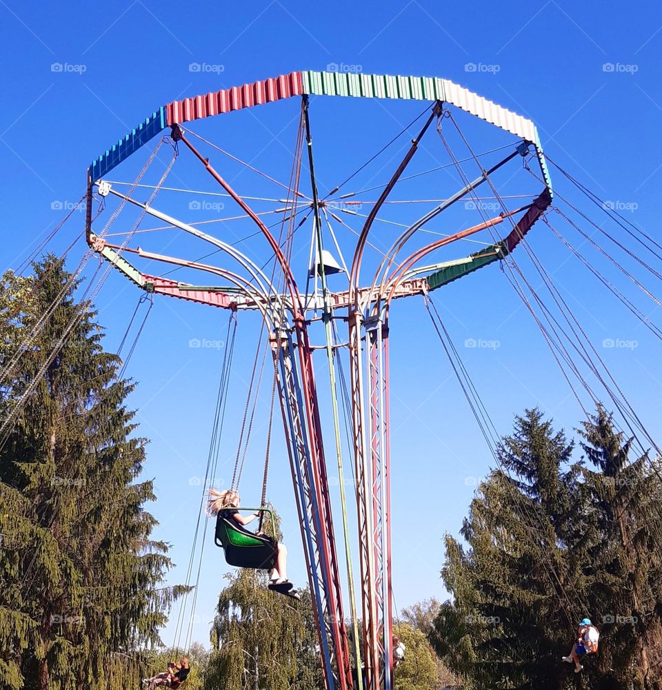 having a nice day in the amusement park