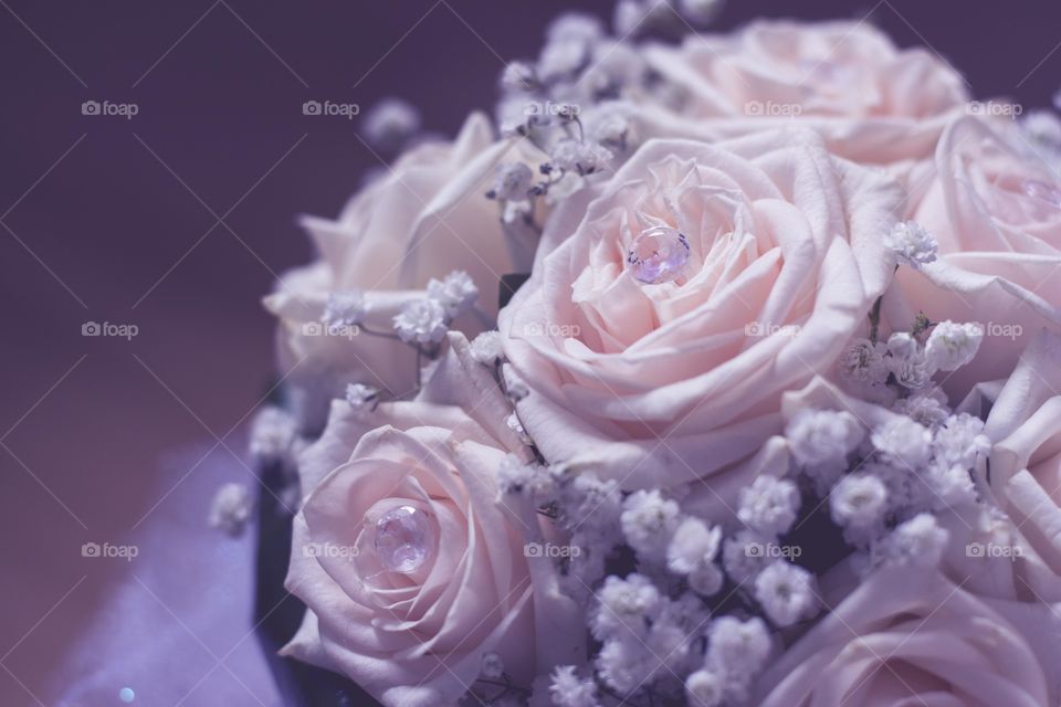 beautiful roses buoquet. white roses with crystals as bridal buoquet