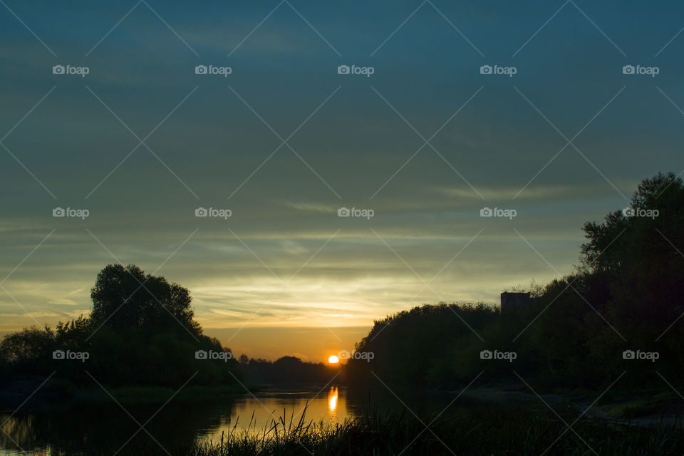 Sunset on river