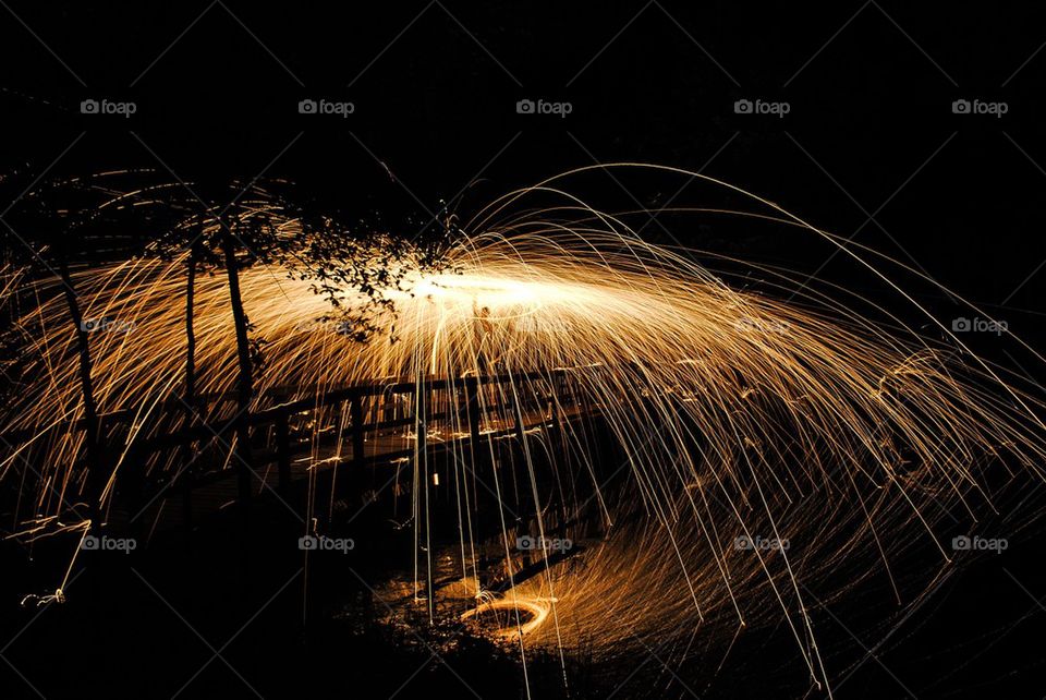 Light painting on a bridge