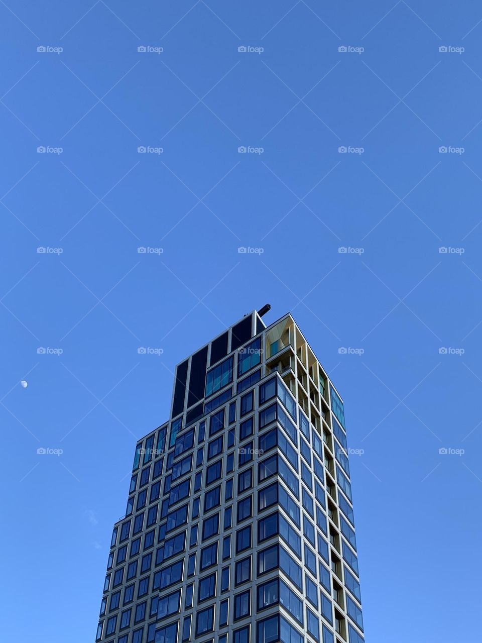 Building exterior against blue sky 