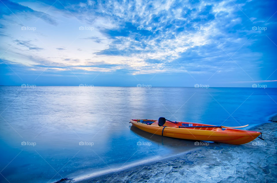 Kayaking and surfing in bay and high ocean waves