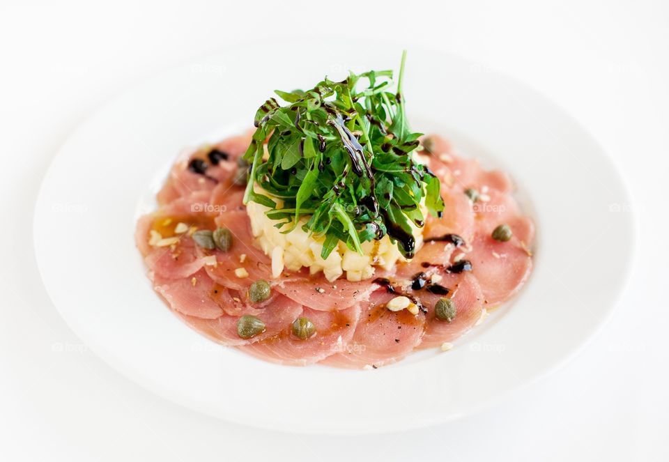 Carpaccio of tuna. Fish salad