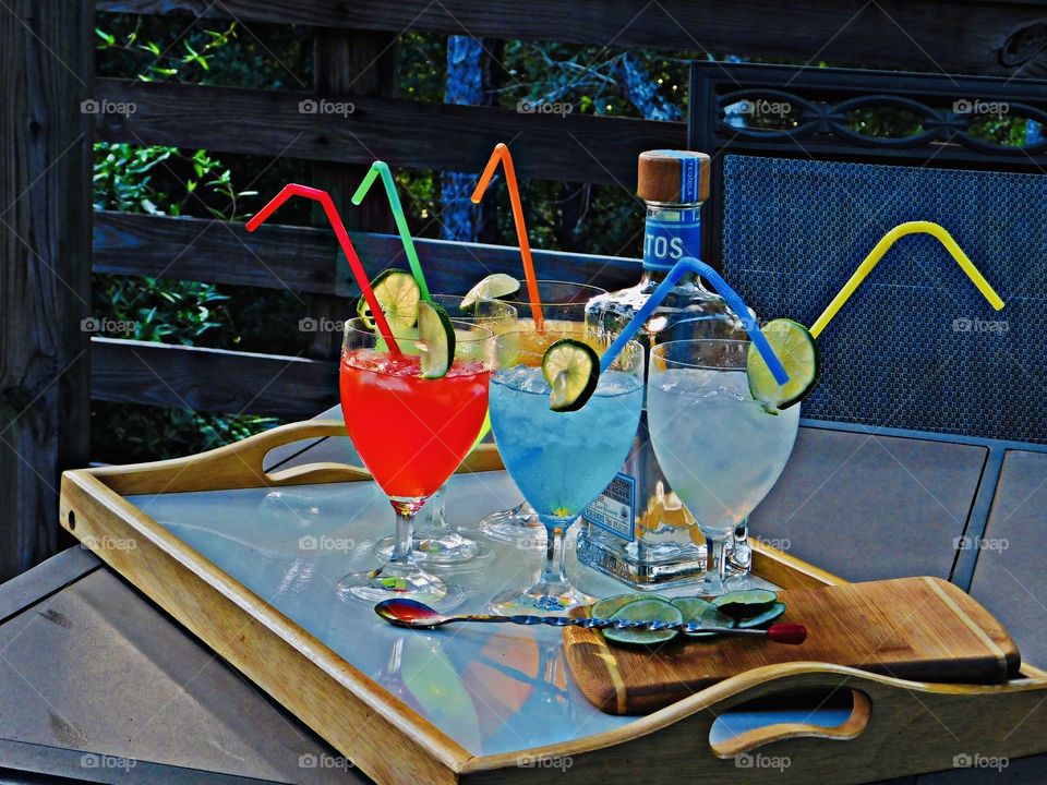 Liquids - display of colorful refreshing drinks with colorful straws