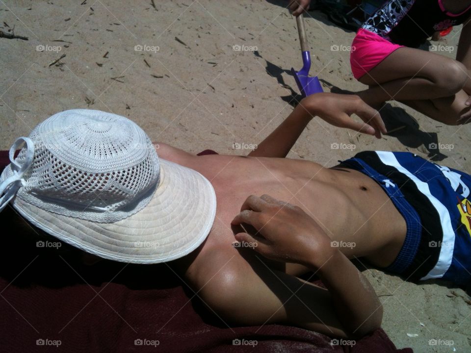 Sun tanning down in Rehoboth Beach, DE 