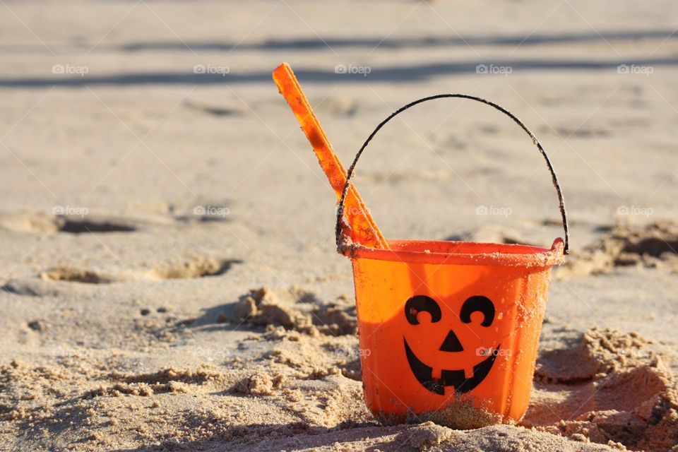 Trick or treat basket on the beach 