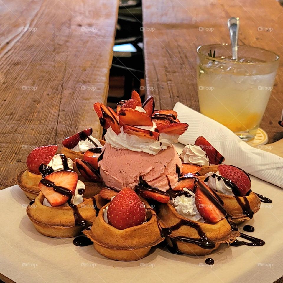 Strawberry Waffles with Whipped cream , Chocolate Sauce and Strawberry Ice Cream