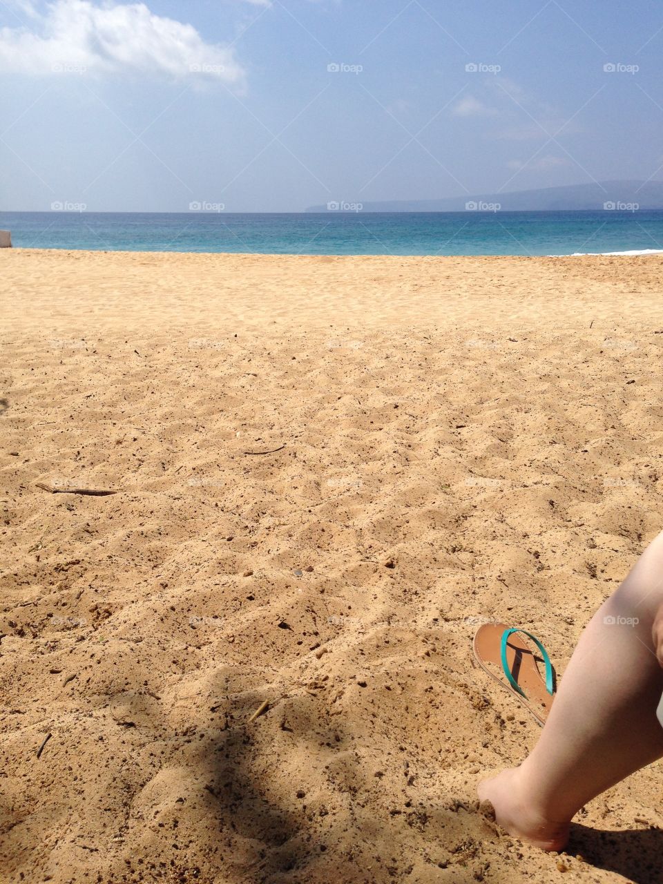 Alone at the beach. Shoes