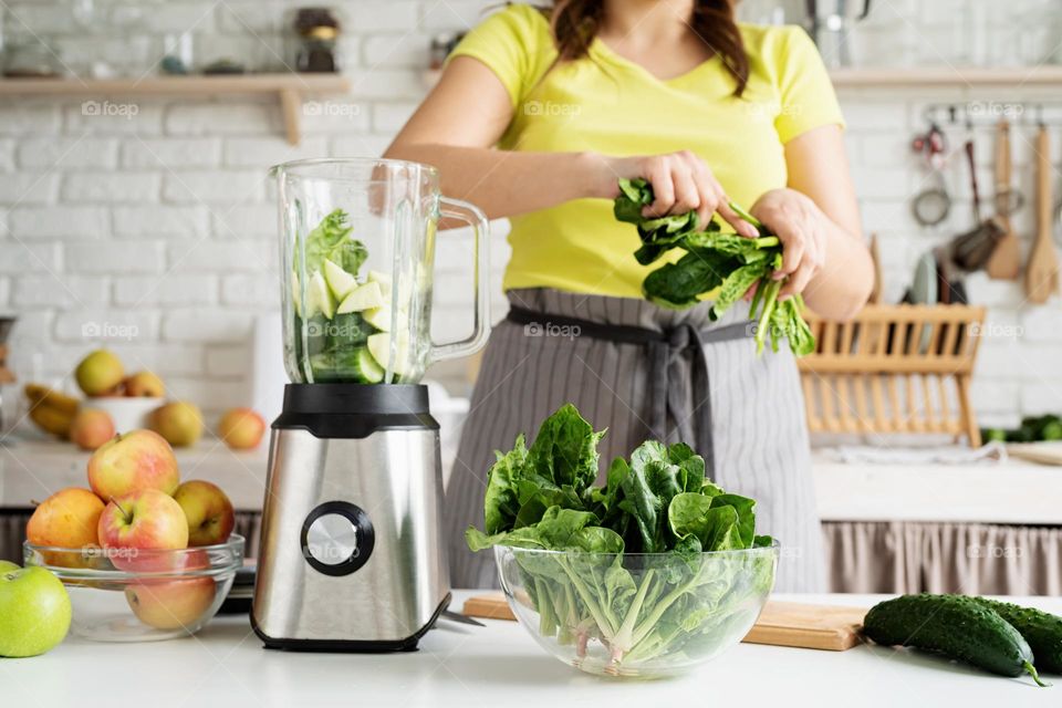 woman cooking at kitchen