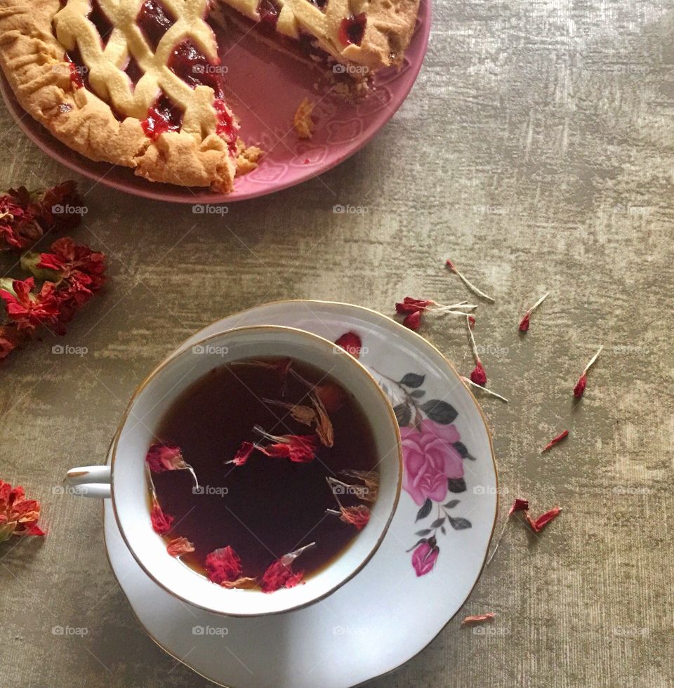 Tea cup with cherry pie