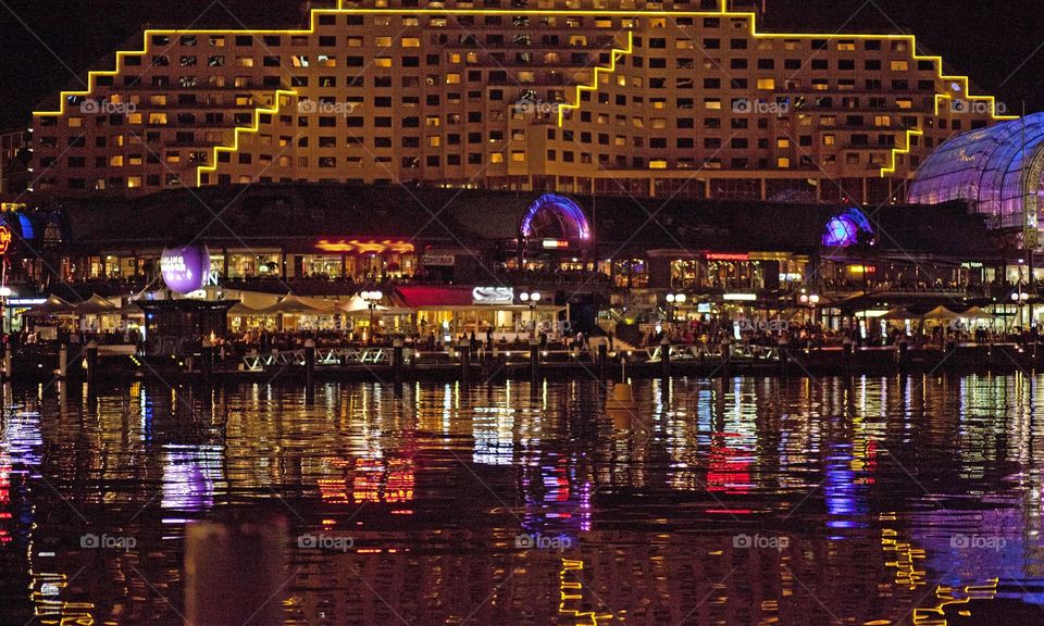 City night lights reflecting on water, Marina, restaurant by the river, Darling Harbour, Sydney Australia, NSW