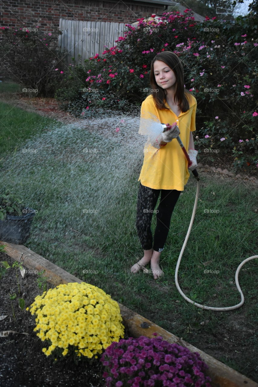 Watering The Flowers