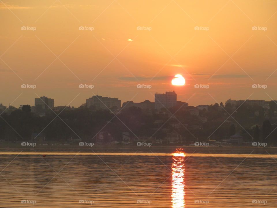 sunset over the city and the river in October, the city of Voronezh