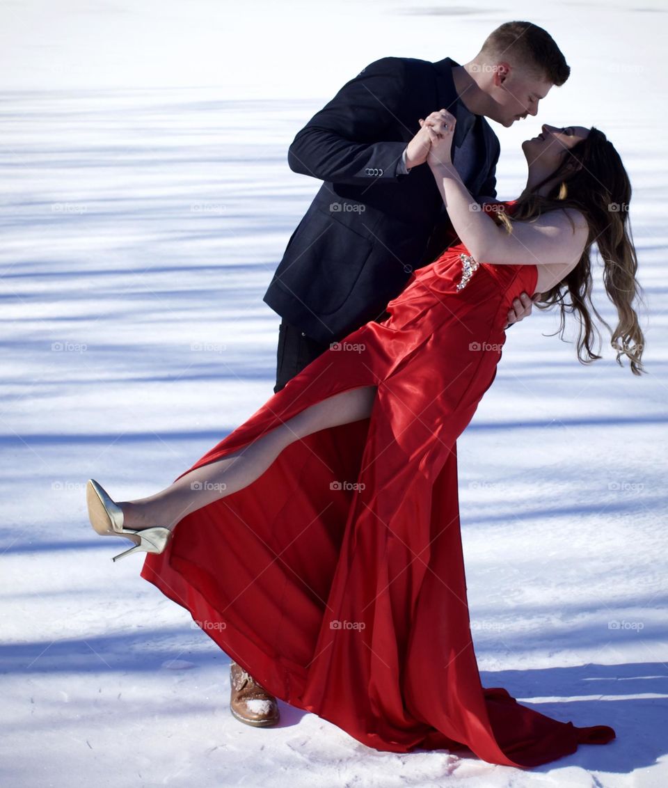 Beautiful Red Dress Dance on a frozen lake