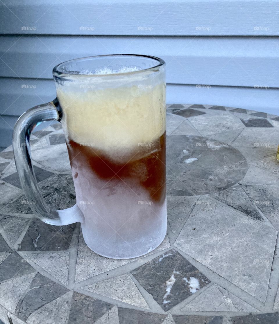 Frosty cold glass of homemade beer