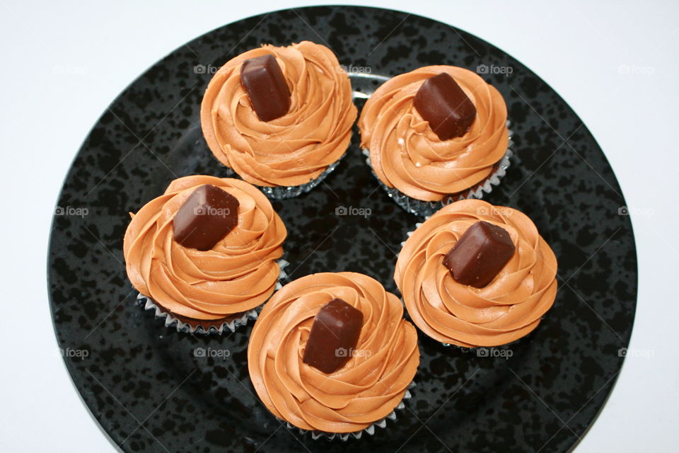 Chocolate cupcakes with caramel icing