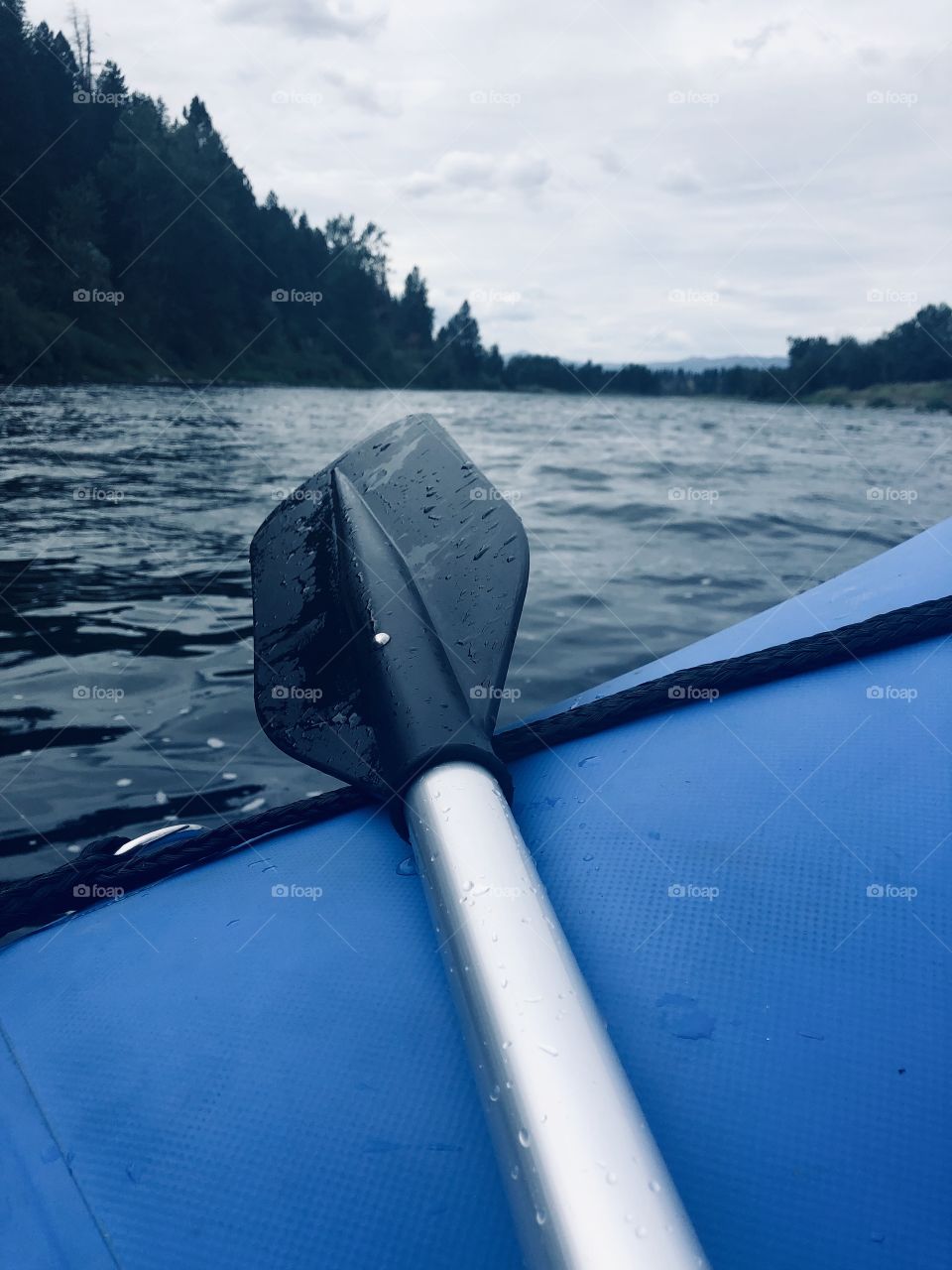 Ore of a very slowly moving raft on a surprisingly stormy day. 