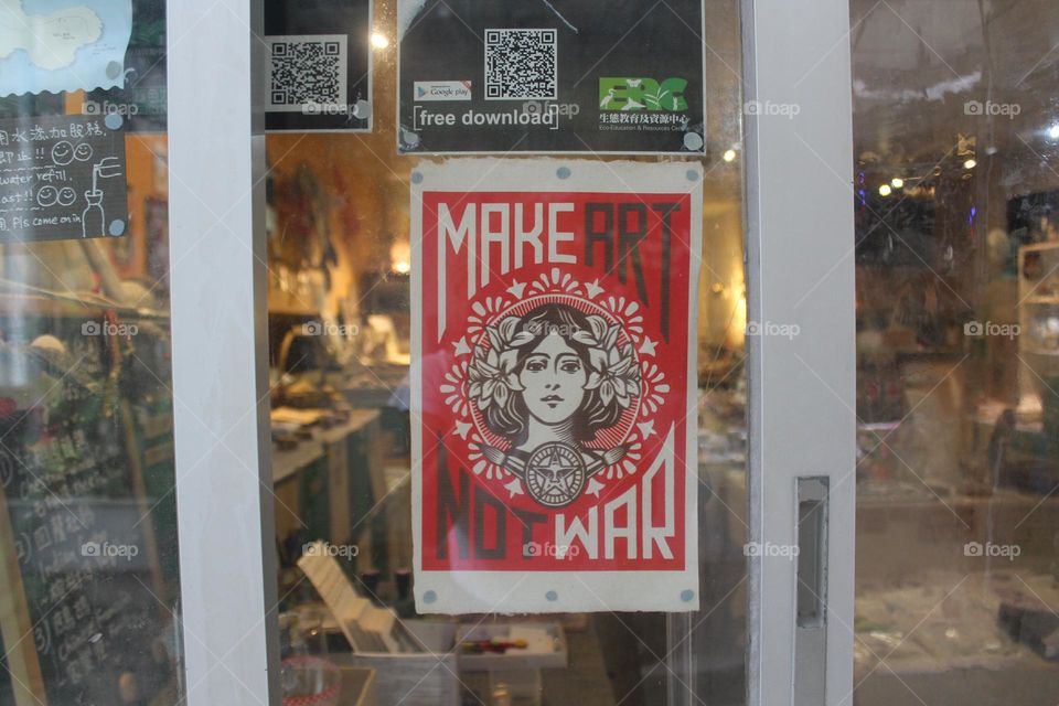 "Make Art, not war" welcome sign of eco-recycling shop in Lamma Island, Hong Kong.