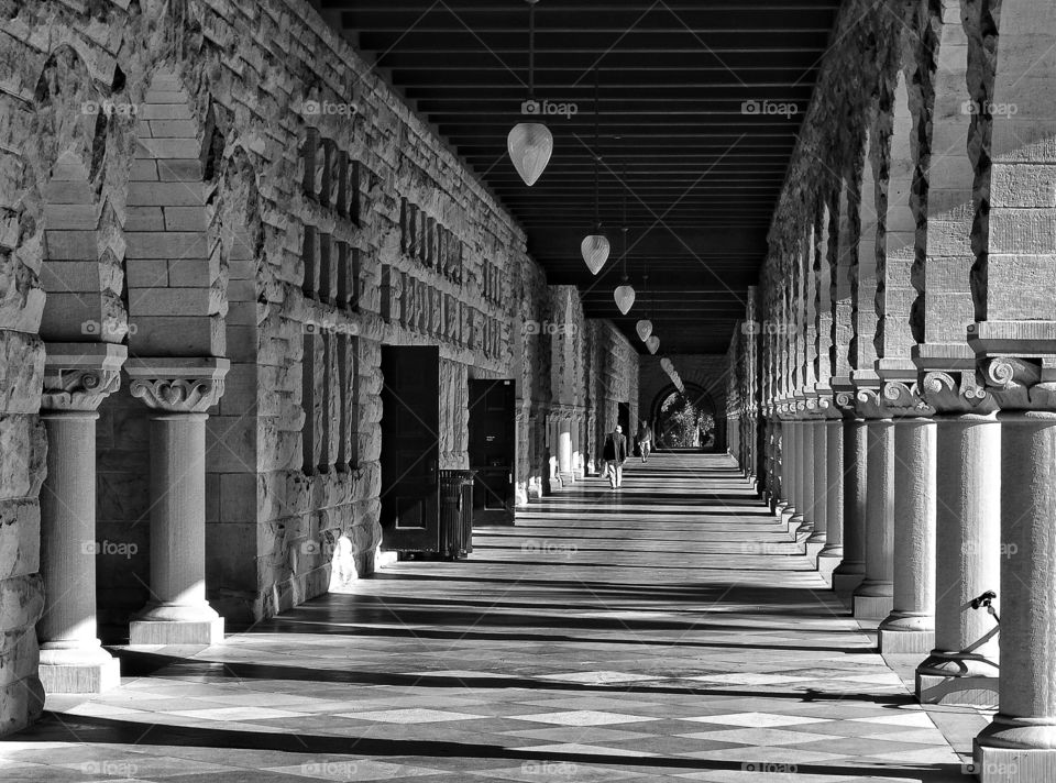 Black And White Architecture. Light And Shadows In Columned Hallway
