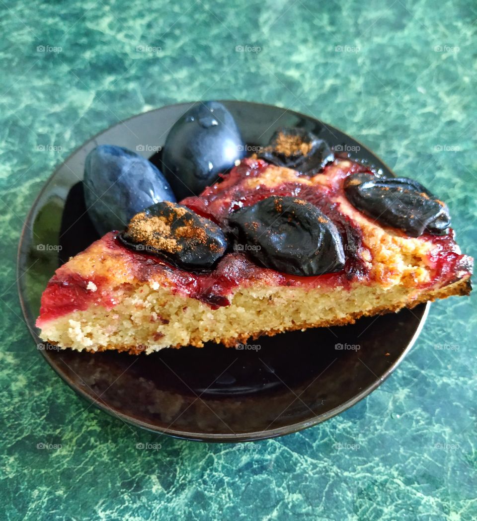 Fragrant piece of cake with plums