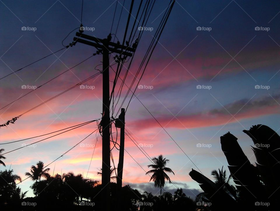 sinset in Caribbean . beautiful sunset and electric wire's