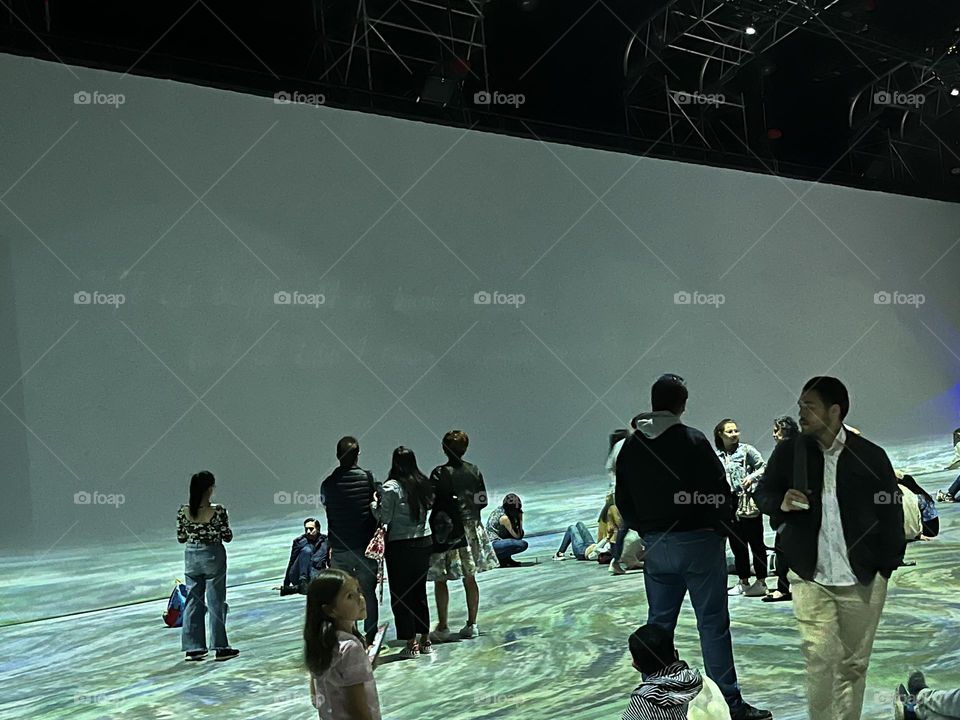 People waiting for the art