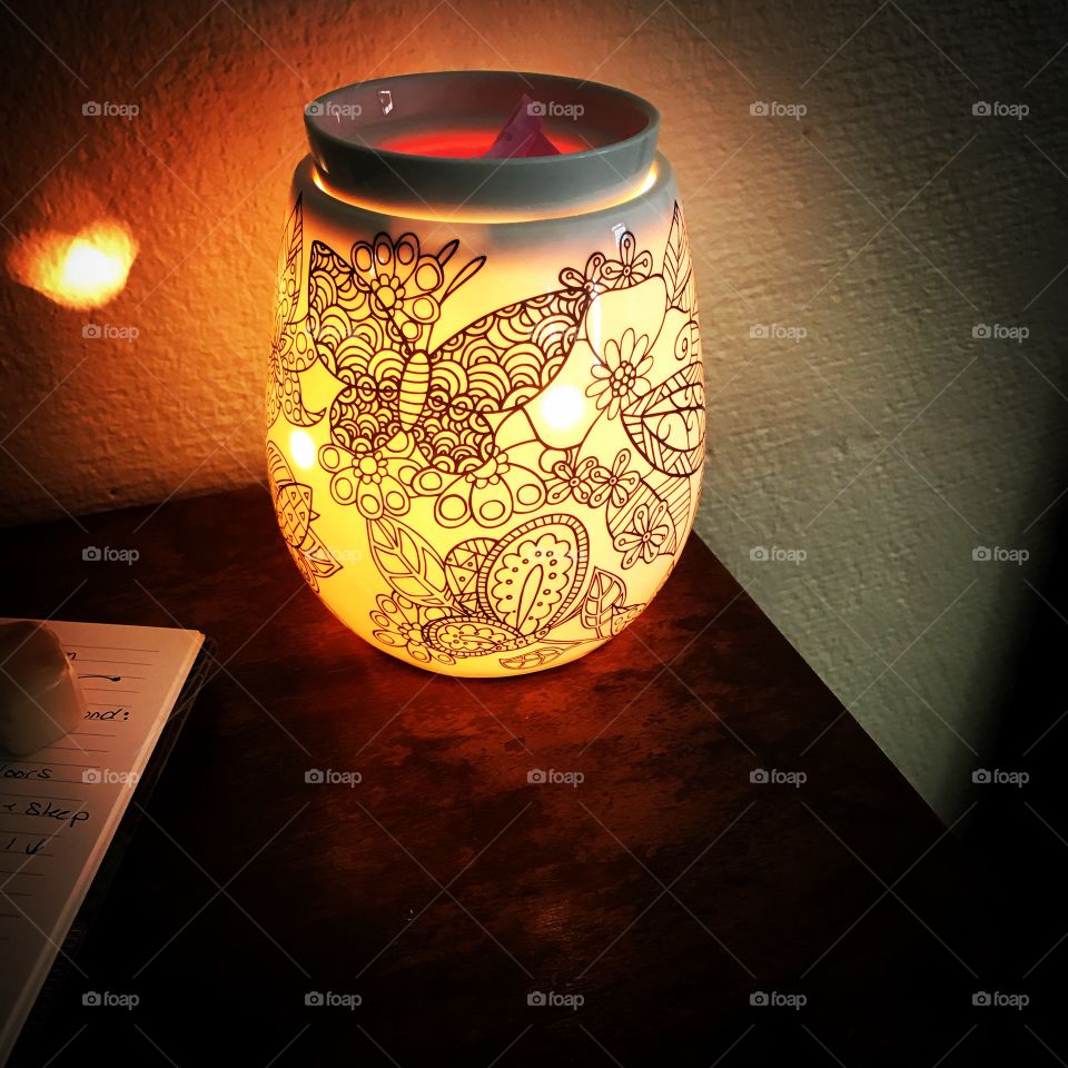 My new butterfly Scentsy wax cube warmer lit up at night 