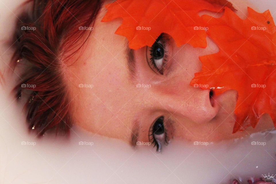 Artistic photo in a milky water with two beautiful eyes.