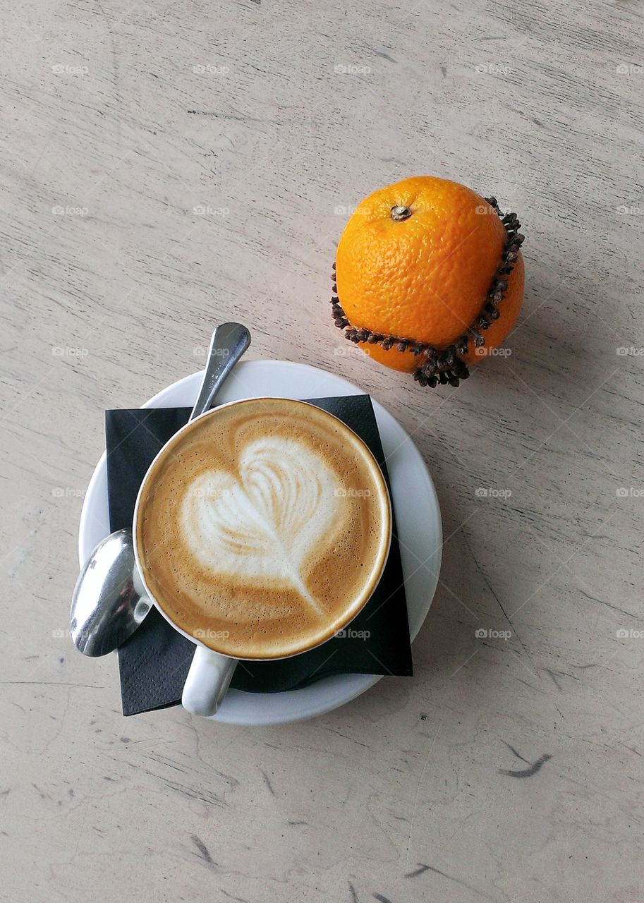 Coffee latte and orange