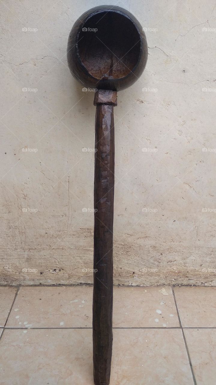 The ancient dipper is made of coconut skin and wood