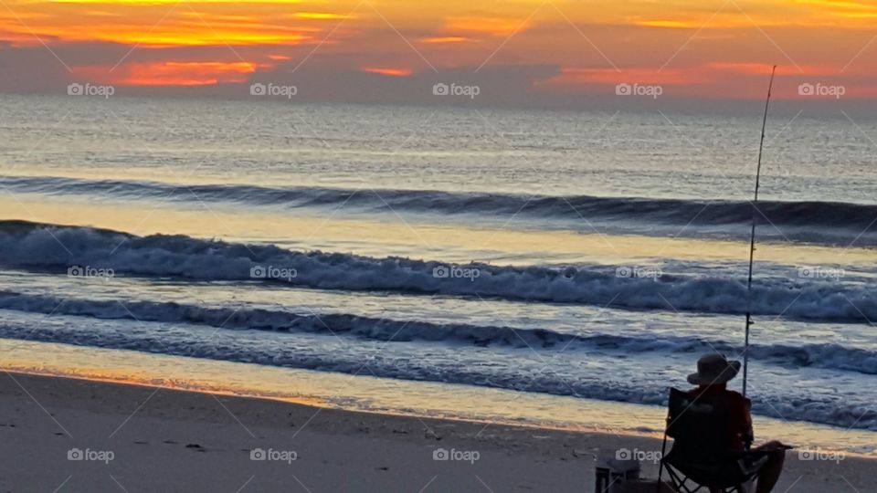 surf fishing at dawn