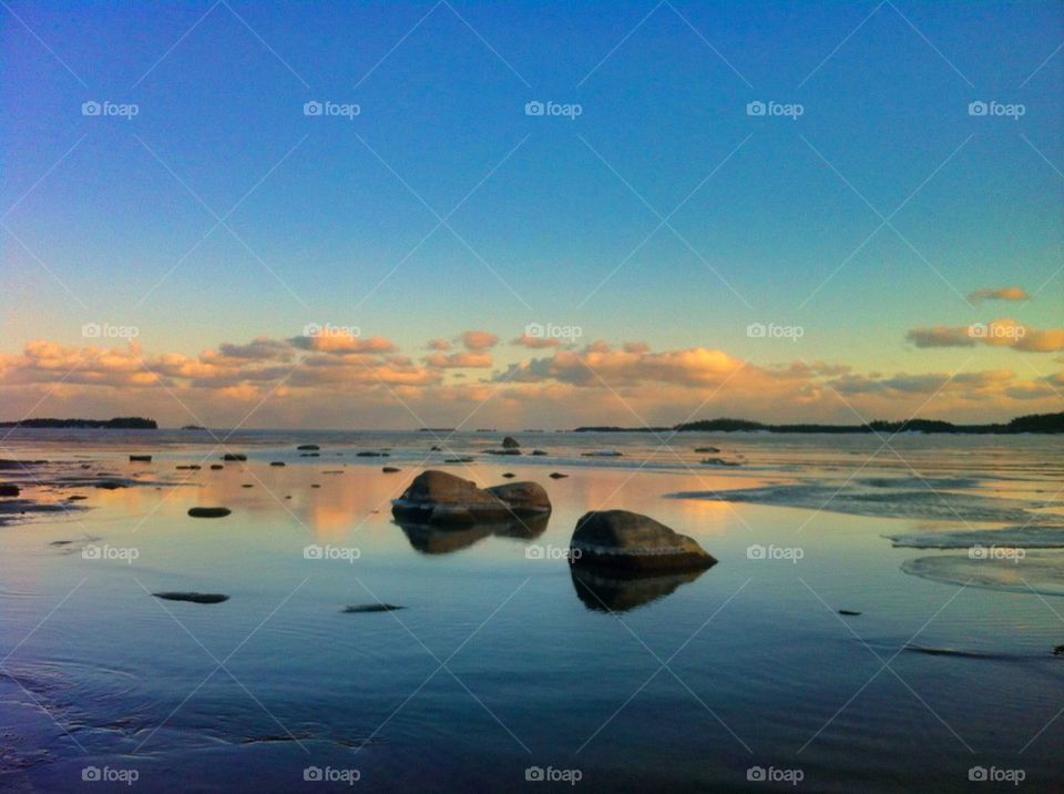 Scenic view of beach against sky