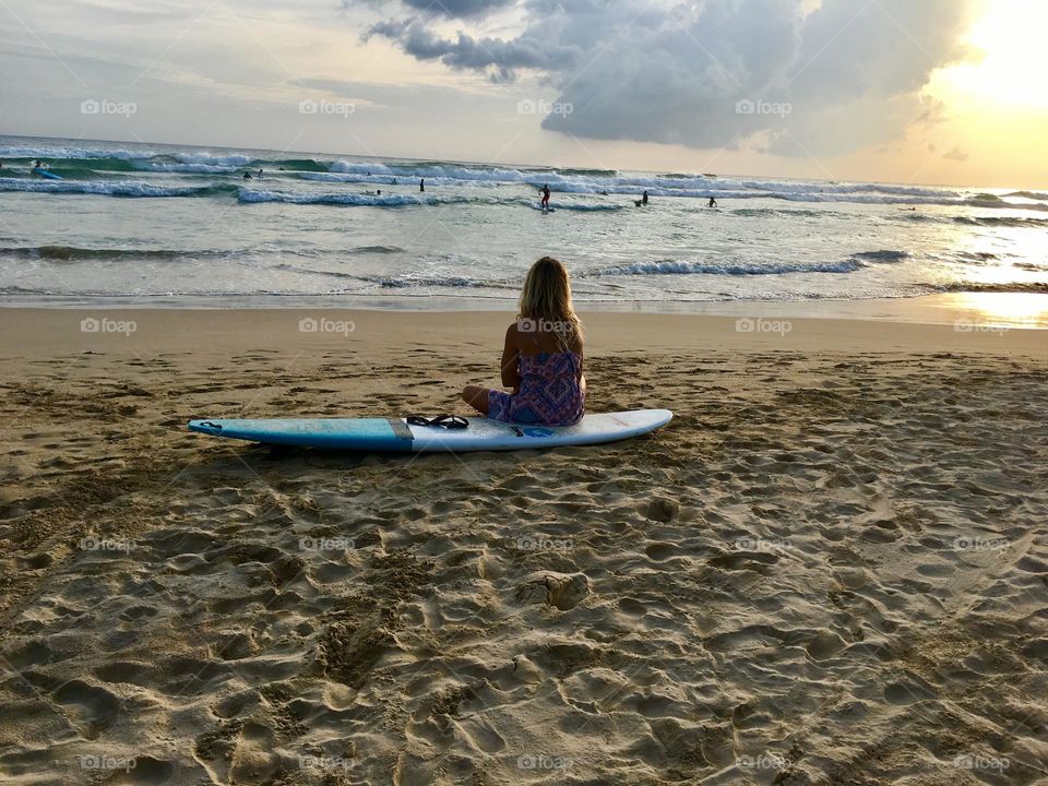 Meditating after a day surfing the waves