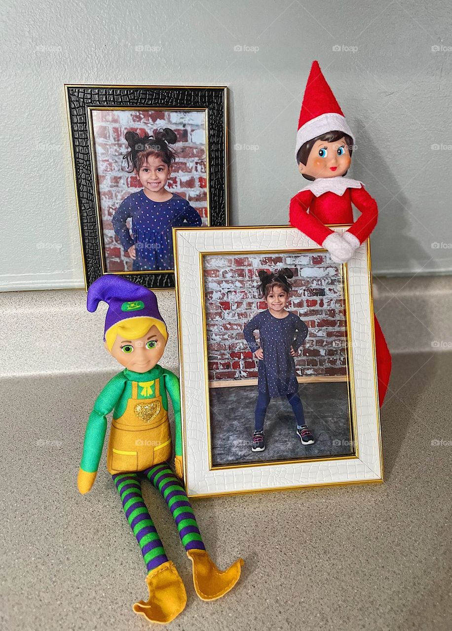 Elf on the shelf antics, framing school pictures of kids, elves help mommy frame pictures, fun adventures with elf on the shelf 