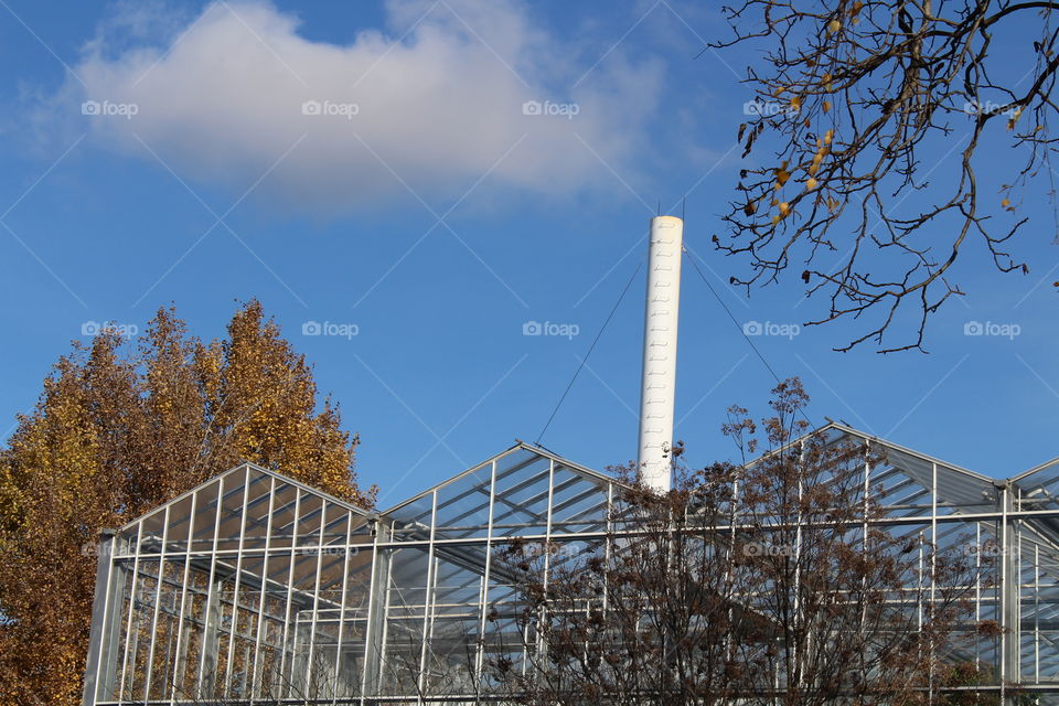 greenhouse with tall white tower