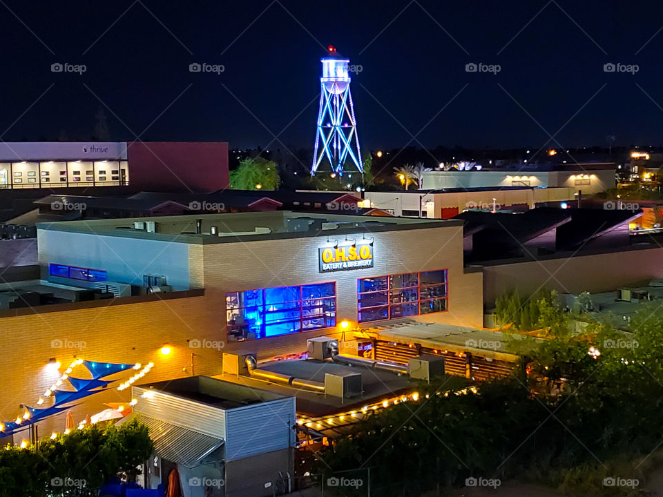 Downtown Gilbert, Arizona glows bright on a spring evening