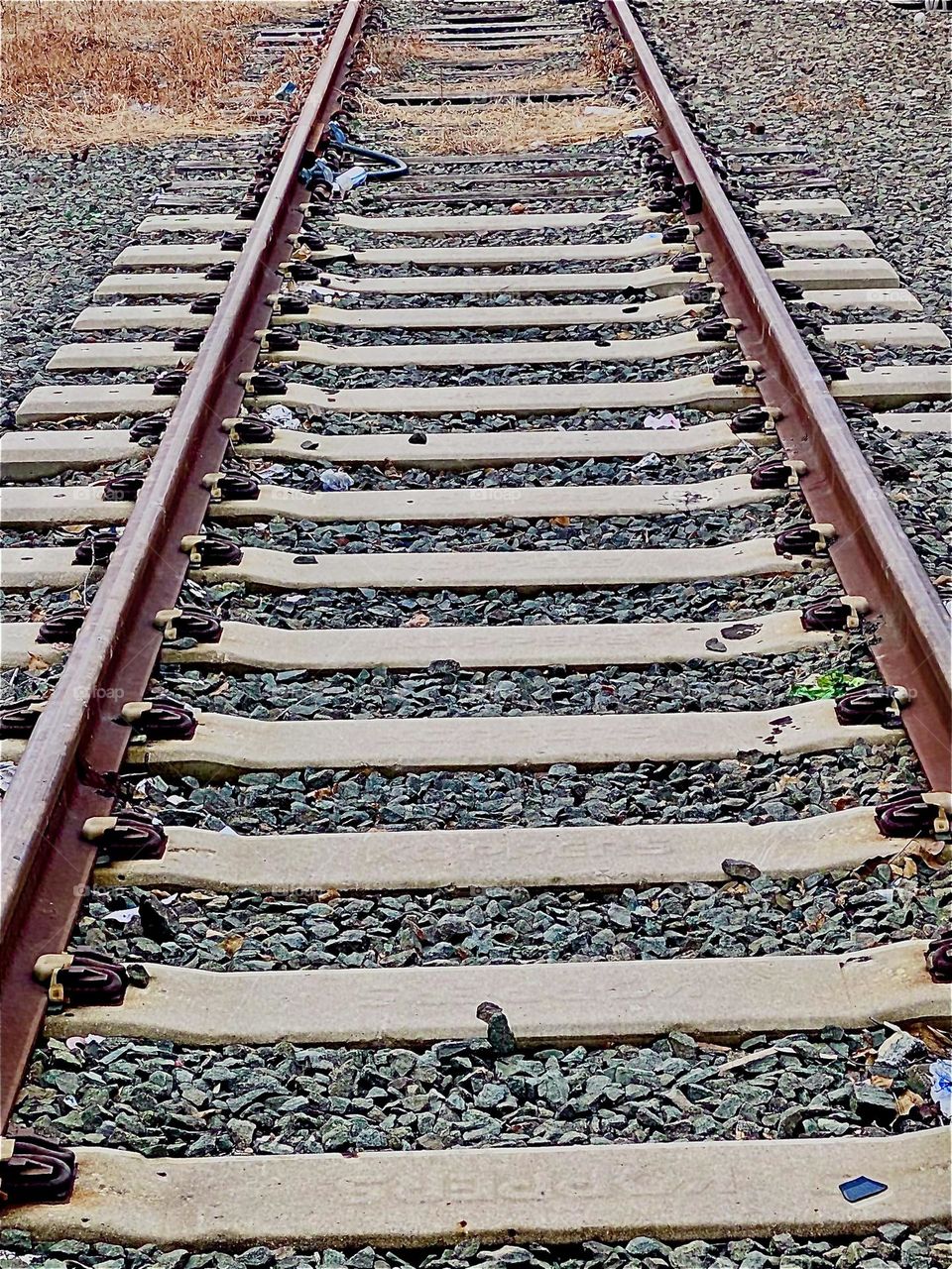 The rails of the train tracks under the Pulaski Bridge in LIC, Queens leading into the distance present a beautiful balanced composition. Form & function add up perfectly in this example of the industrial minimal aesthetic. 2021. Hypnotic Productions