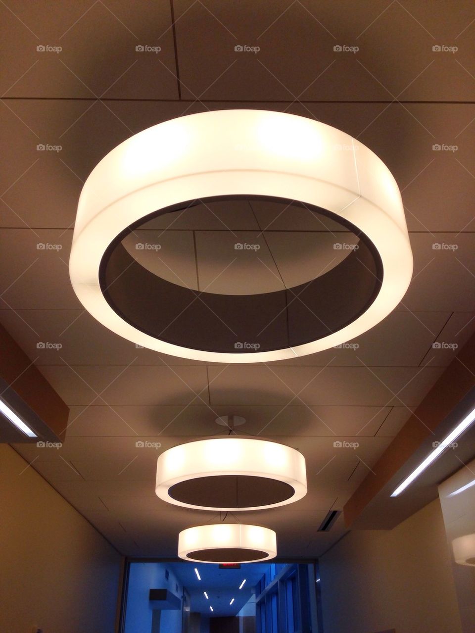 Ceiling lamps in hallway of office