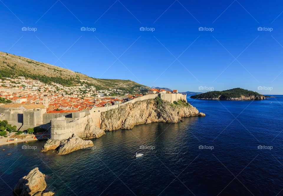 Bright sunny day at Dubrovnik old town in summertime at mediterranean sea