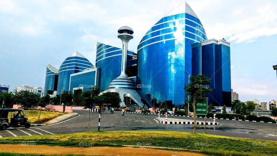 World Trade Park -Jaipur, Rajasthan. 2nd WTP of Asia- great architecture work, defination of World class shopping and food with 200+ stores. Location at it par beauty. Blue colour outside and totally warm welcome of everyone is specialty of WTP India