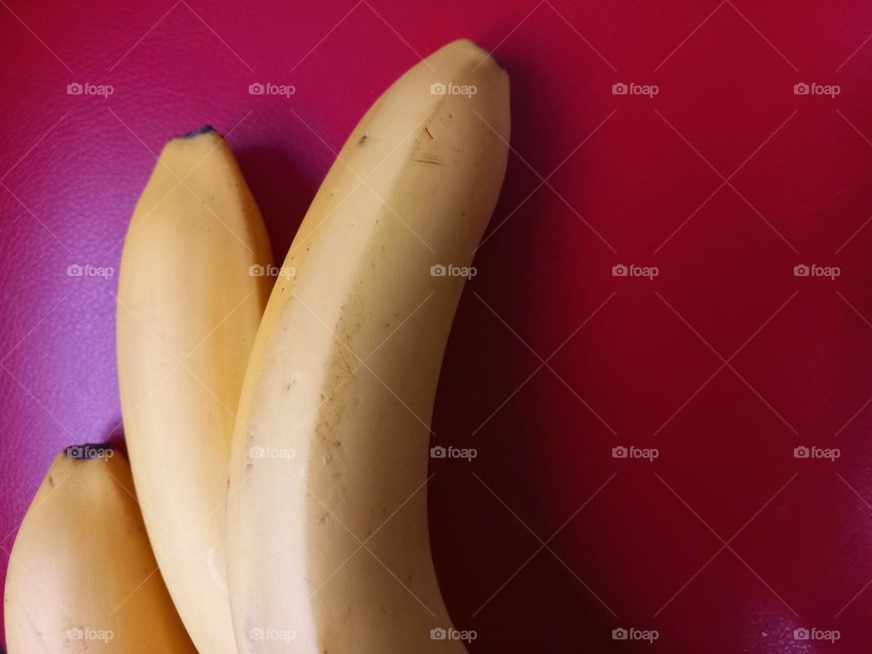 bananas on a red background.