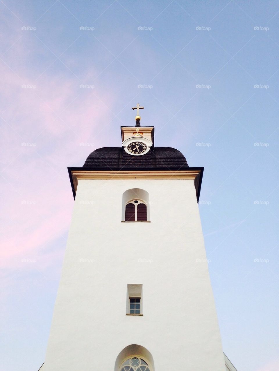 Low angle view of church clock tower