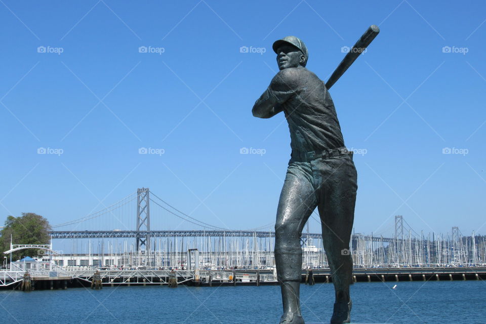 Willie McCovey with Bay Bridge in background