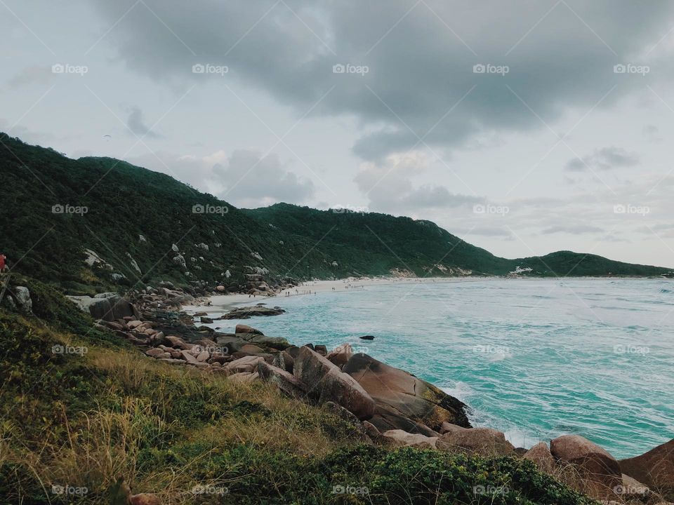 The Galheta beach in Florianópolis, Santa Catarina on a cloudy day.