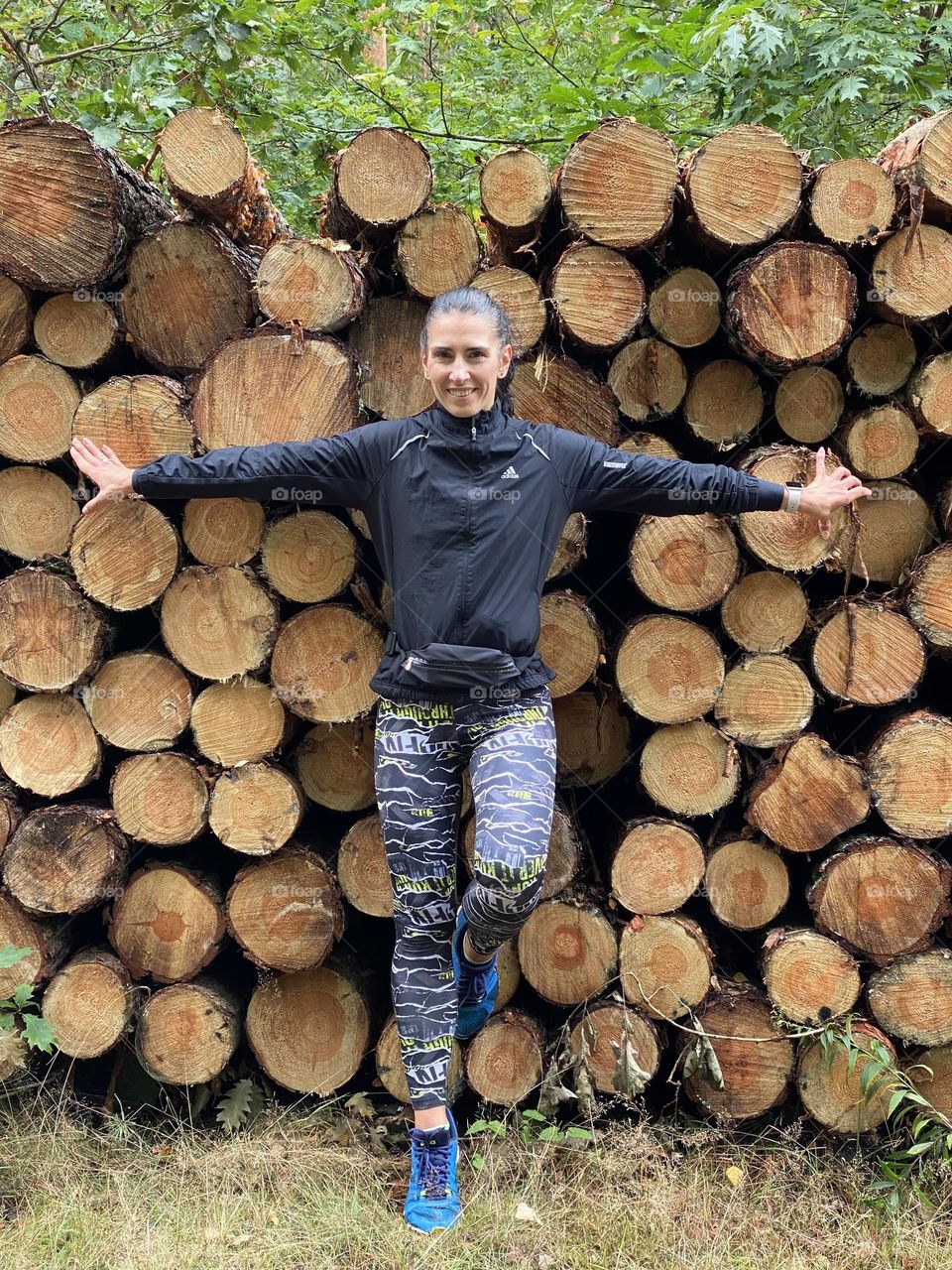 Woman standing in a forest 