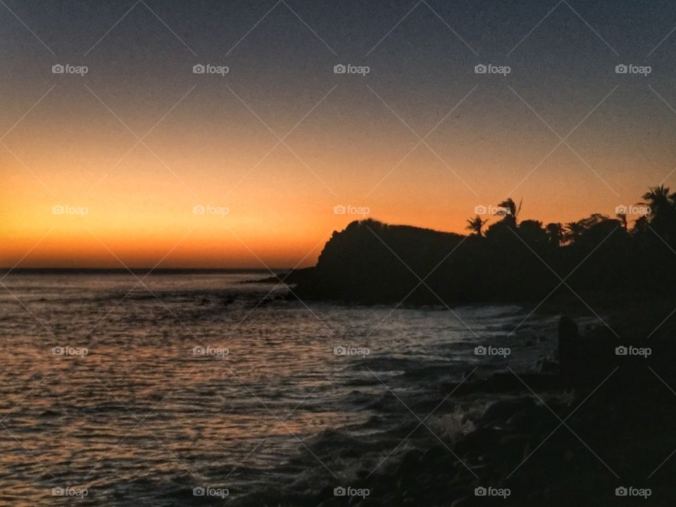 Coast line in silhouette.