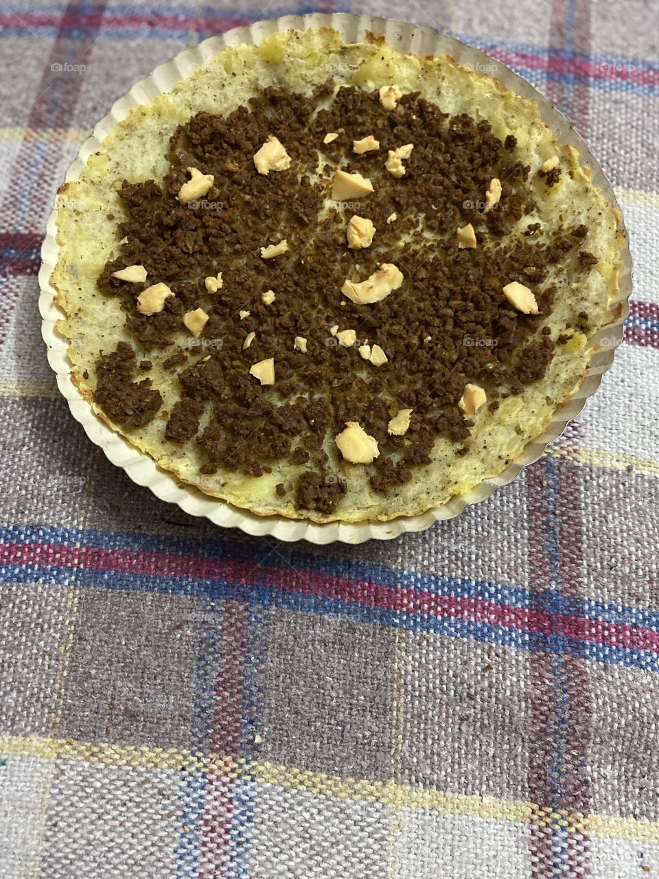 Potato tray with meat and yellow cheese