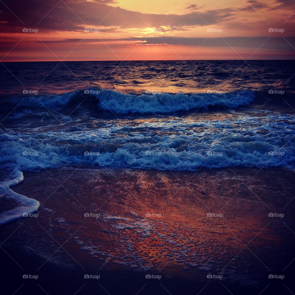 wonderful mood at sunset on the beach of sylt overlooking the sea 